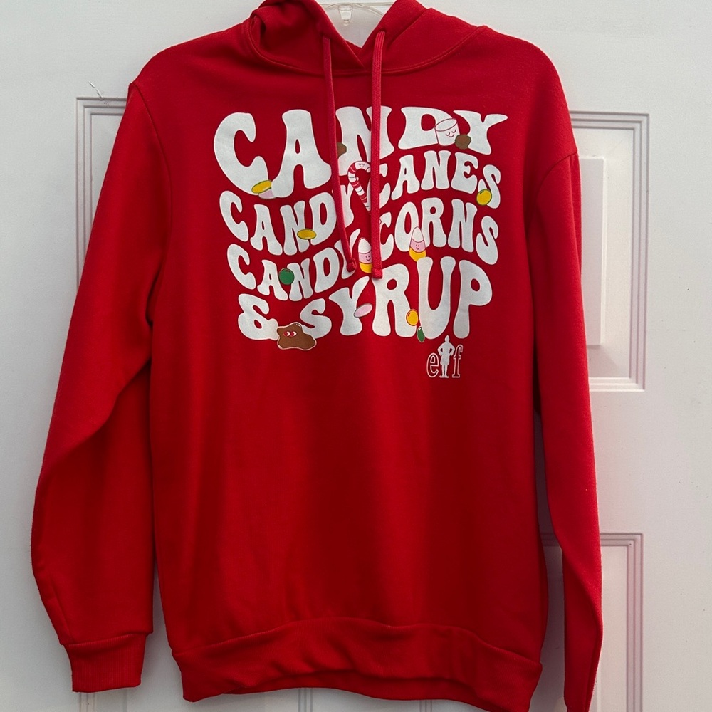 Red Elf Graphic Hoodie XS “Candy, Candy Canes, Candy Corns, & Syrup”